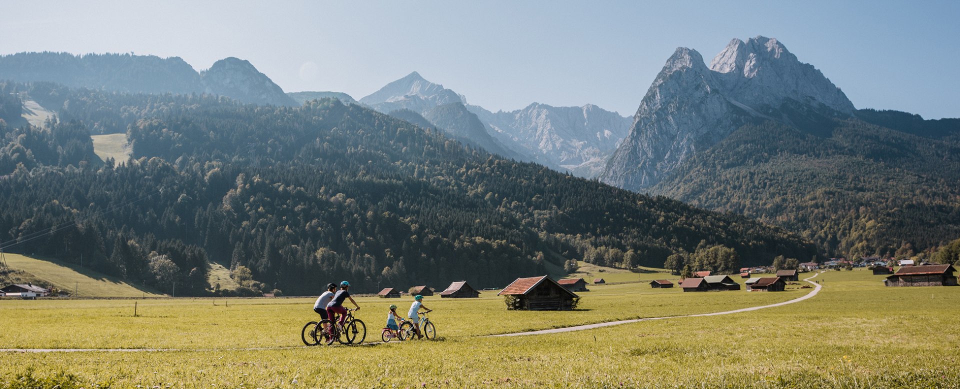 Bicycling with nice Zugspitze view, © Zugspitzland - T.Marzusch